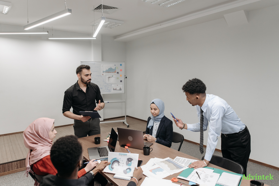 Finance team discussing oman e-invoicing requirements and digital tax compliance planning